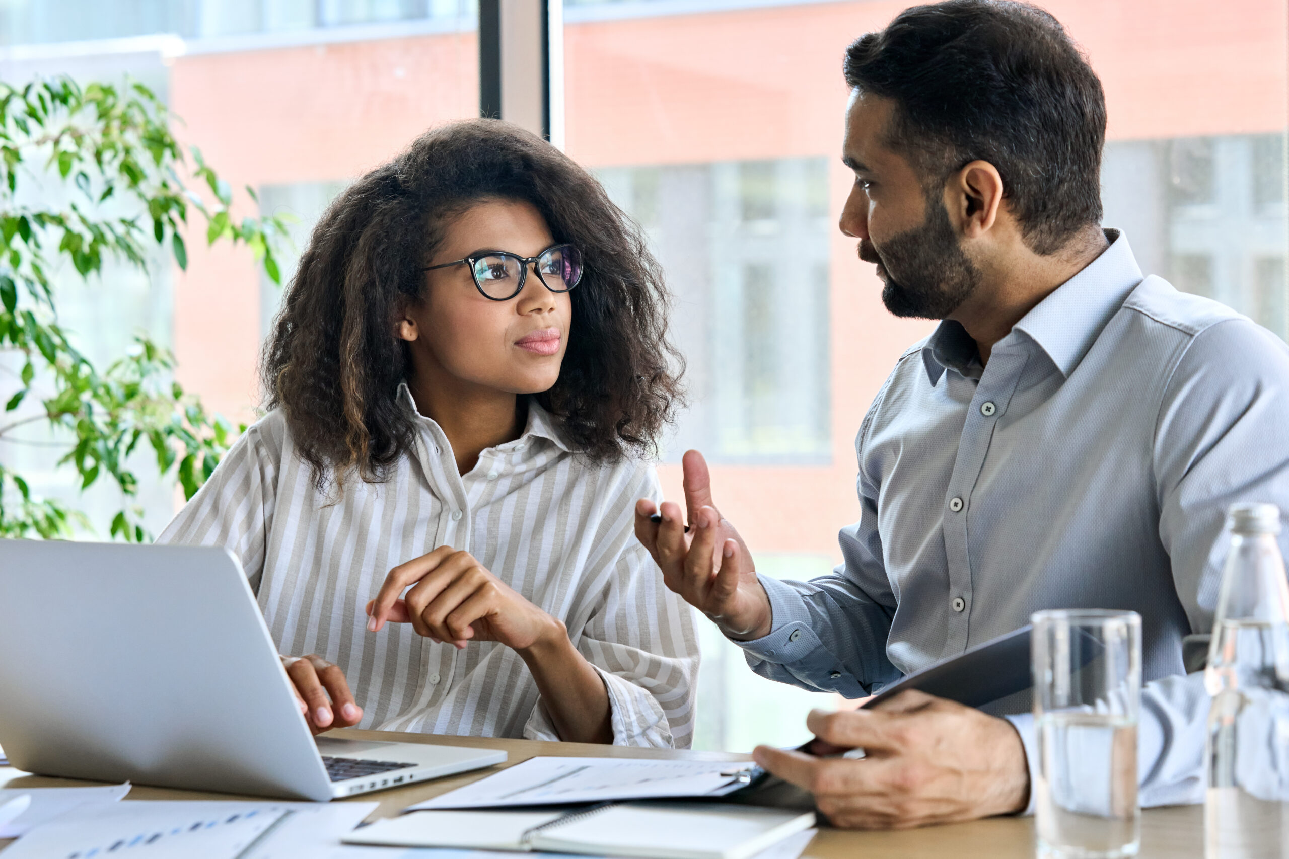 People discussing financial information together